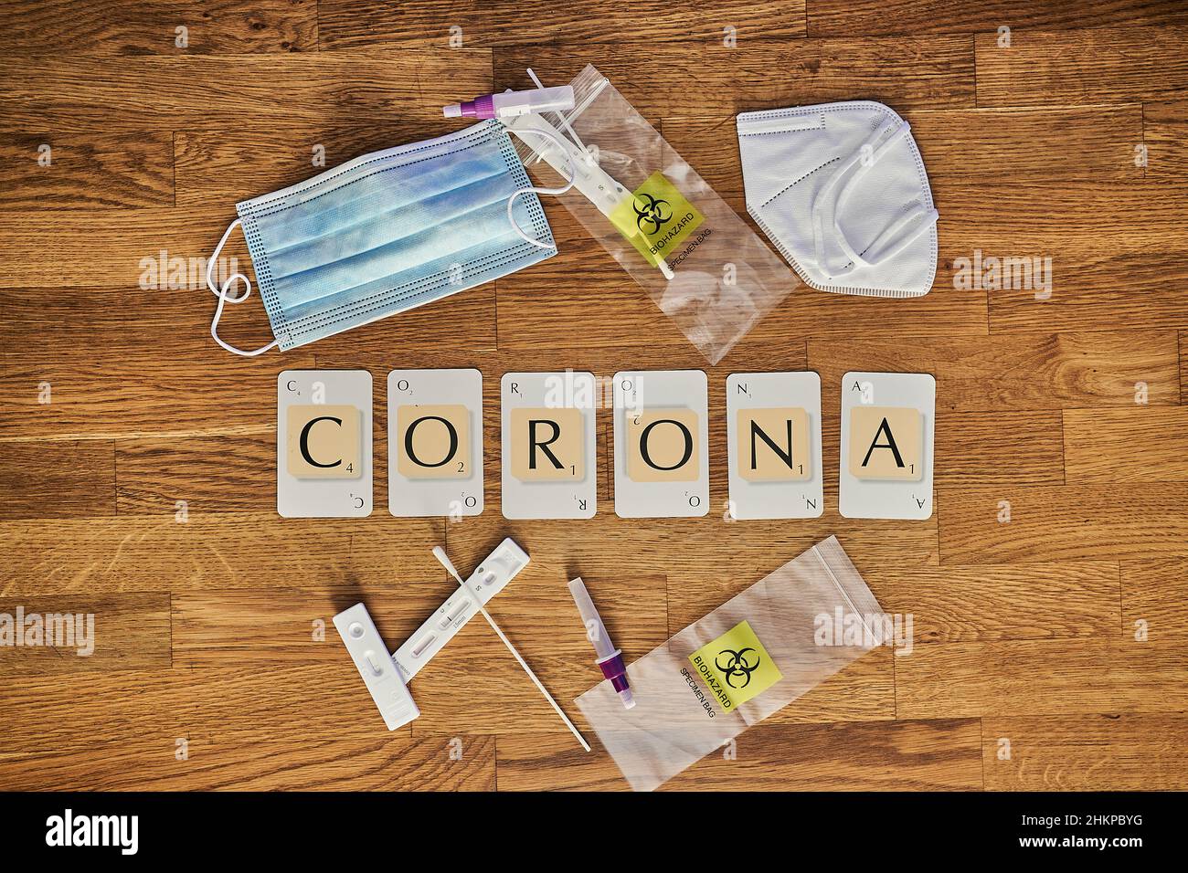Scrabble letter cards spelling the corona covid 19 Pandemic related word Corona Stock Photo