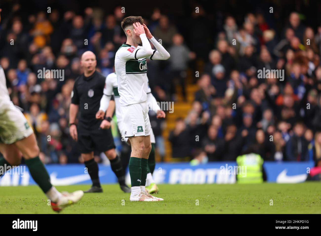 5th February 2022 :  Stamford bridge, Chelsea, London, England: FA Cup football, Chelsea v Plymouth Argyle: Ryan Hardie of Plymouth Argyle holds his head as he misses a penalty kick in the last minutes of the game Stock Photo