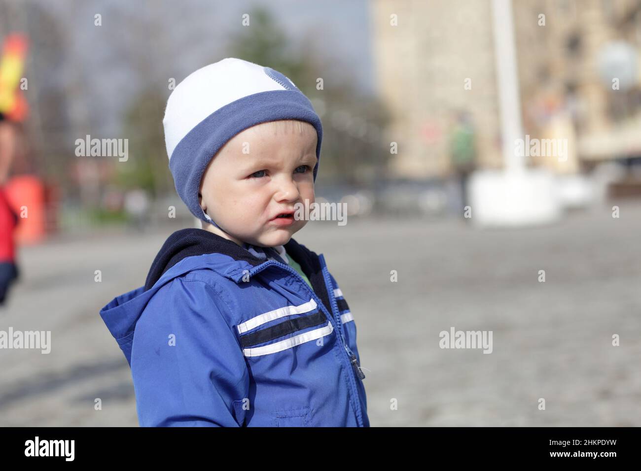 Portrait of sad little boy outdoor in spring Stock Photo - Alamy