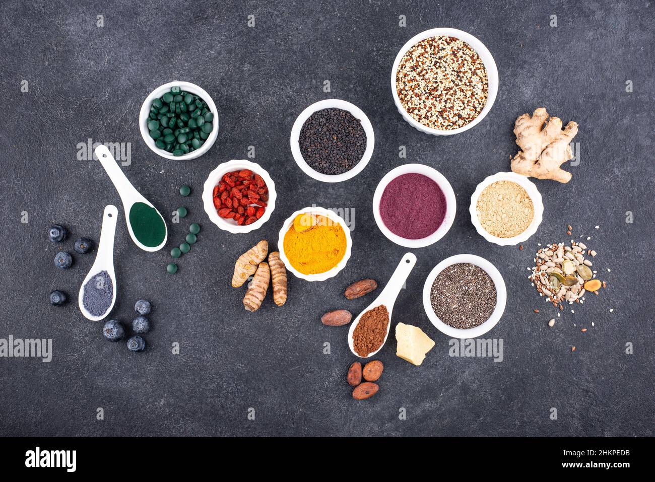 Various healthy superfoods powder assortment Stock Photo - Alamy