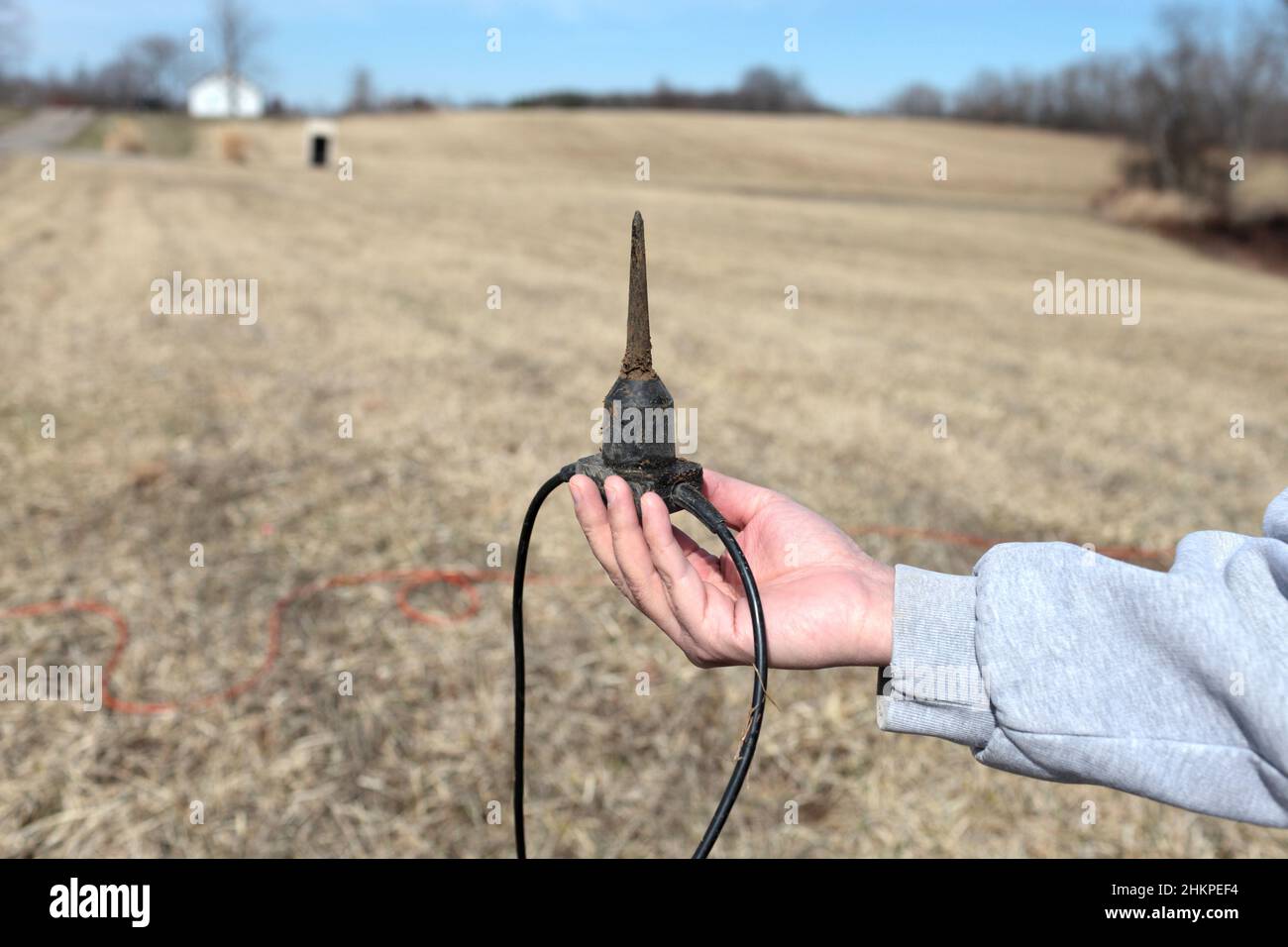 Prospector holds Sensor Geophones for oil exploration, USA, Ohio Stock Photo