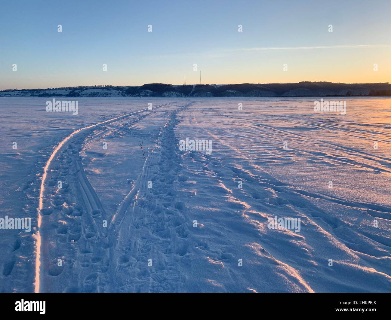 snowmobile tracks in the snow. Landscape Stock Photo - Alamy