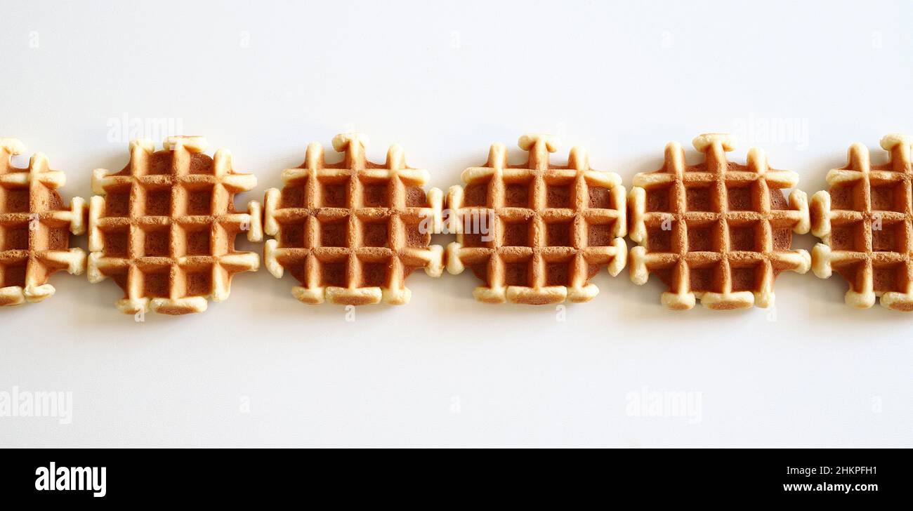 Homemade waffles, Belgian breakfast pastry dessert isolated on white