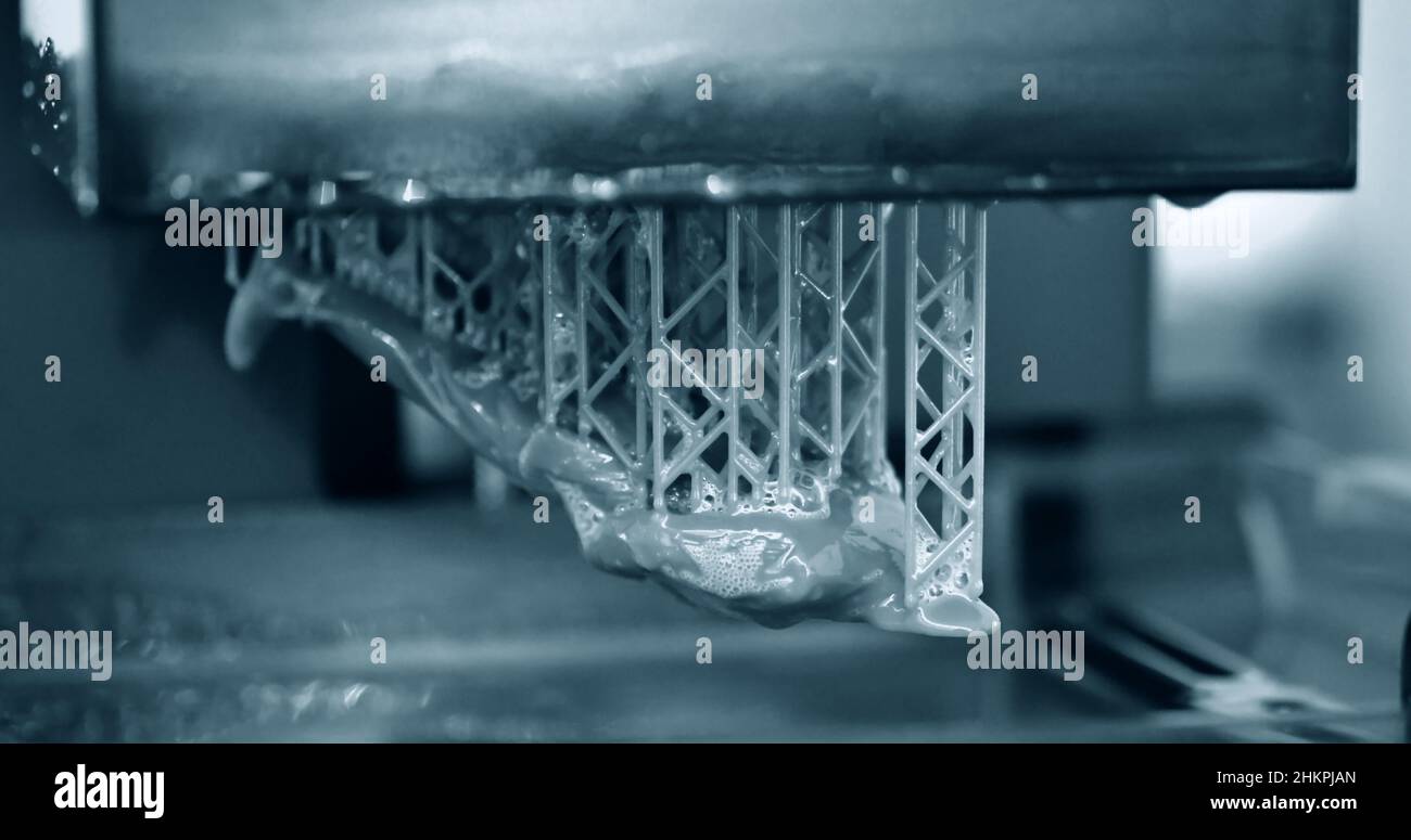 Stereolithography DPL 3d printer create detail and liquid drips Stock Photo
