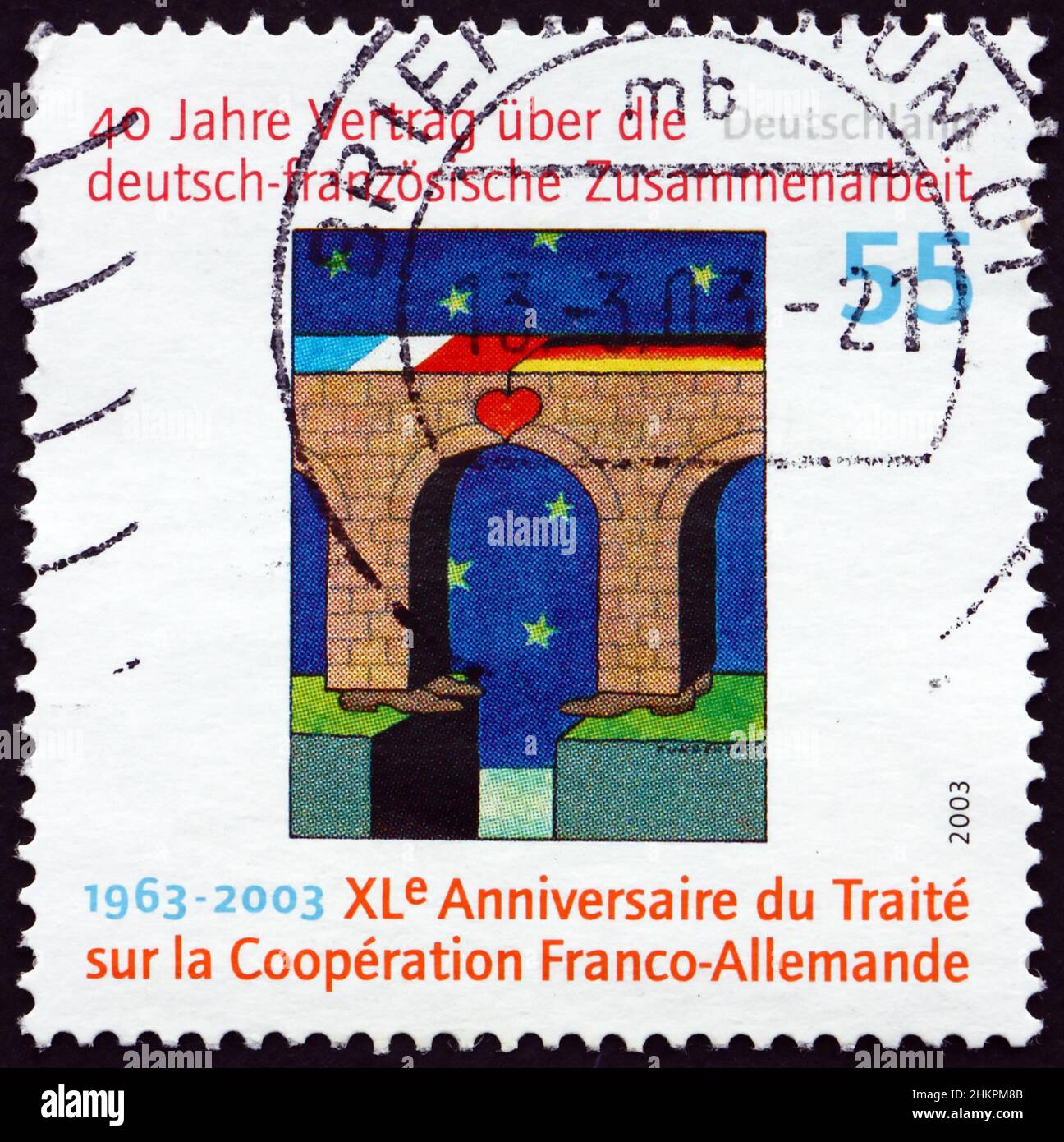 GERMANY - CIRCA 2003: a stamp printed in Germany shows bridge with national flags and heart, 40th anniversary of German-French cooperation treaty, cir Stock Photo