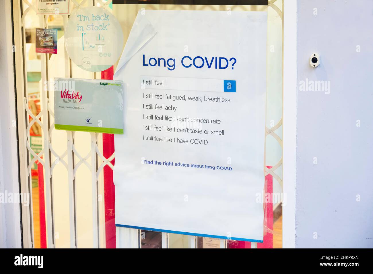 London, England, UK, January 22nd 2022, Long covid symptoms sign on pharmacy shop window UK Stock Photo
