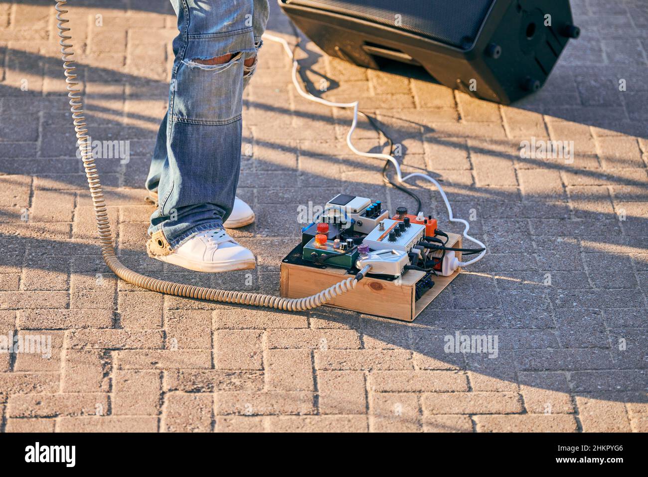 Guitar pedalboard effects pedal box for electric guitar on floor at outdoor rock Effect processor pedals guitarist, device for alters Stock Photo - Alamy