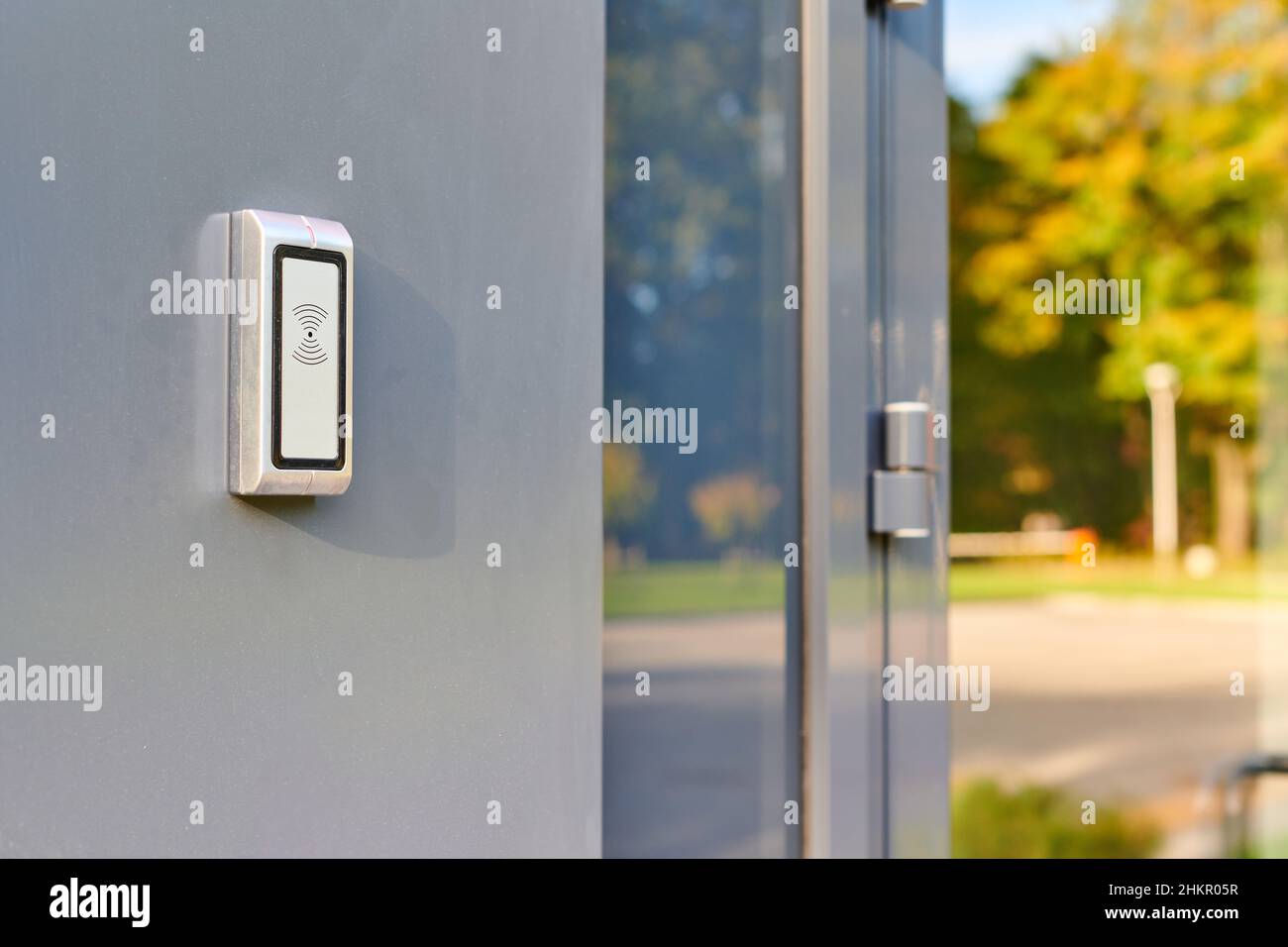 RFID reader at office entrance for access by RFID key card, lock and