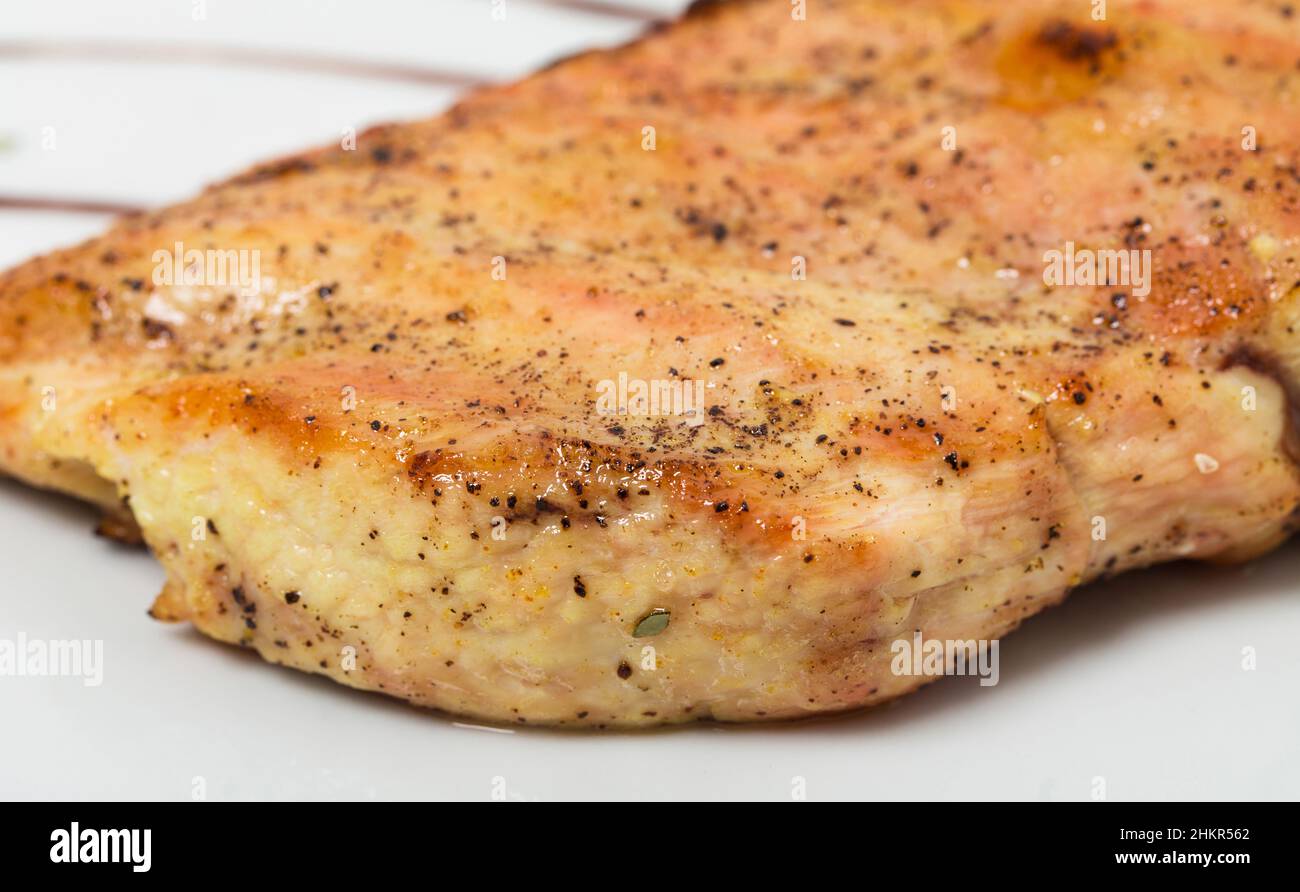 Grilled chicken fillet with vegetables. As a whole background Stock