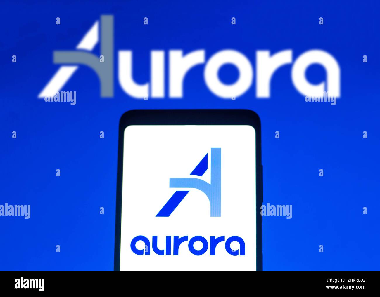 In this photo illustration the Aurora Innovation logo seen displayed on