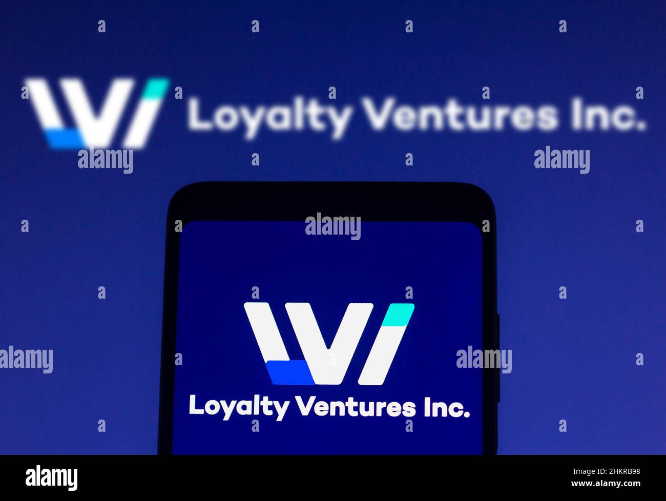 In this photo illustration the Loyalty Ventures logo seen displayed on