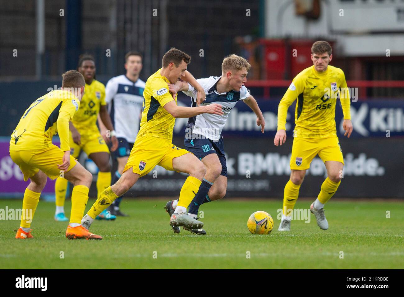 5th February 2022 :  Dens Park, Dundee, Scotland: Scottish Premiership football, Dundee versus Ross County; Max Anderson of Dundee bursts past Jordan Tillson of Ross County Stock Photo