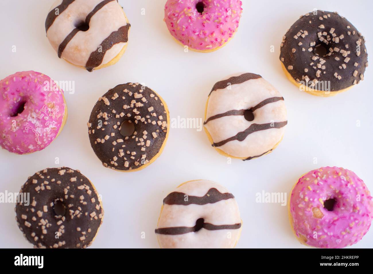 Colorful and sweet glazed donuts Stock Photo