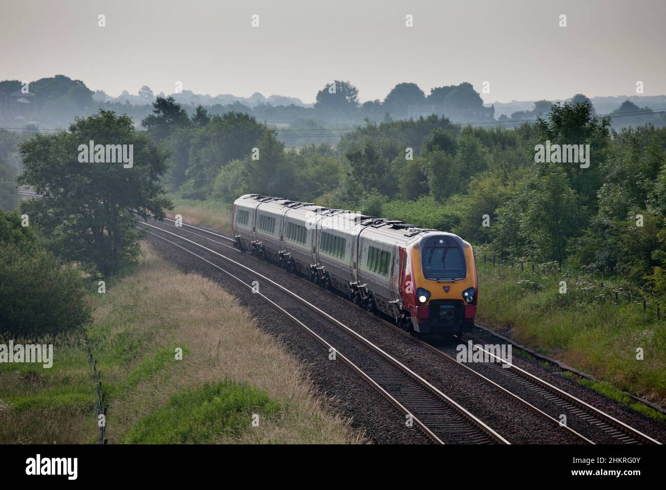 Virgin Trains class 221 bombardier diesel voyager train 221114 passing Lostock, Lancashire with a train diverted due to engineering work Stock Photo
