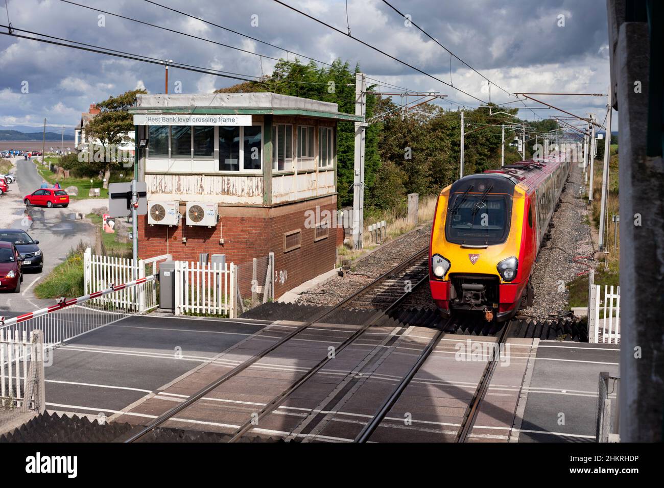 Virgin Trains class 221 voyager train passing the closed signal box at Hest Bank level crossing on the west coast mainline in Lancashire Stock Photo