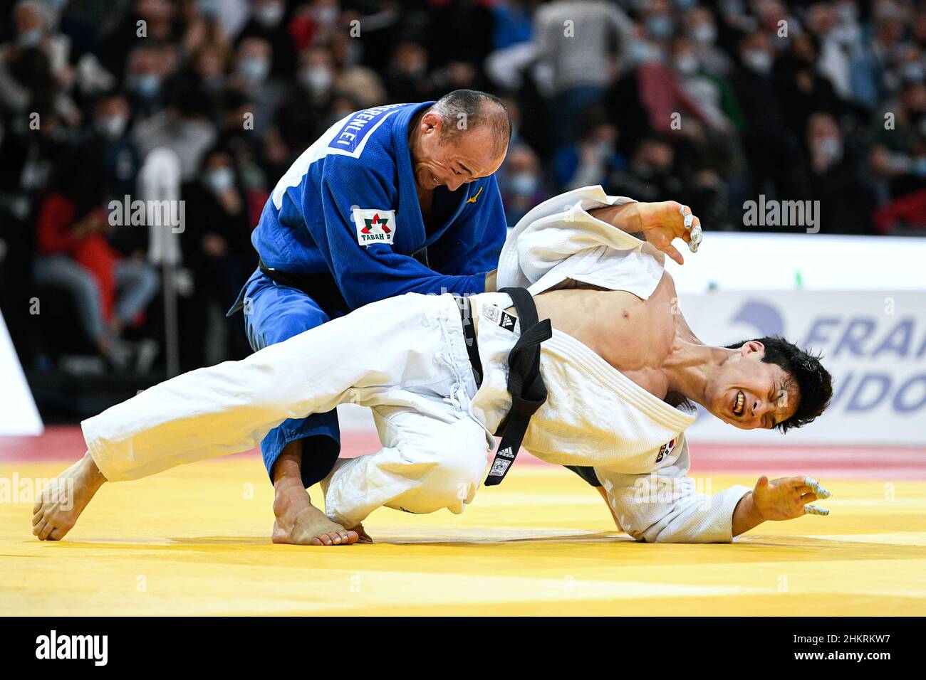 Men's -66 kg, Baskhuu Yondonperenlei of Mongolia (blue) throws An Baul of South Corea (white) during the gold medal contest of the Paris Grand Slam 2022, IJF World Judo Tour on February 5, 2022 at Accor Arena in Paris, France - Photo Victor Joly / DPPI Stock Photo