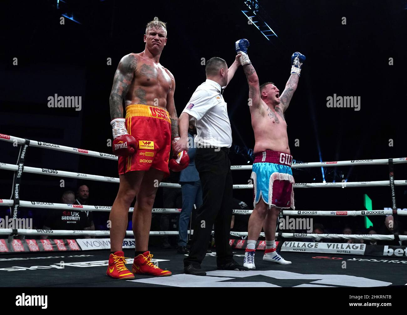Shane Gill (right) celebrates victory against Steve Robinson (left) in the heavyweight contest at the Motorpoint Arena Cardiff. Picture date: Saturday February 5, 2022. Stock Photo