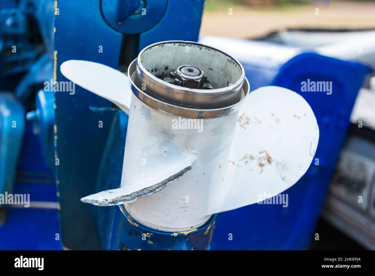 Damaged outboard motor propeller, aluminum propeller with a broken