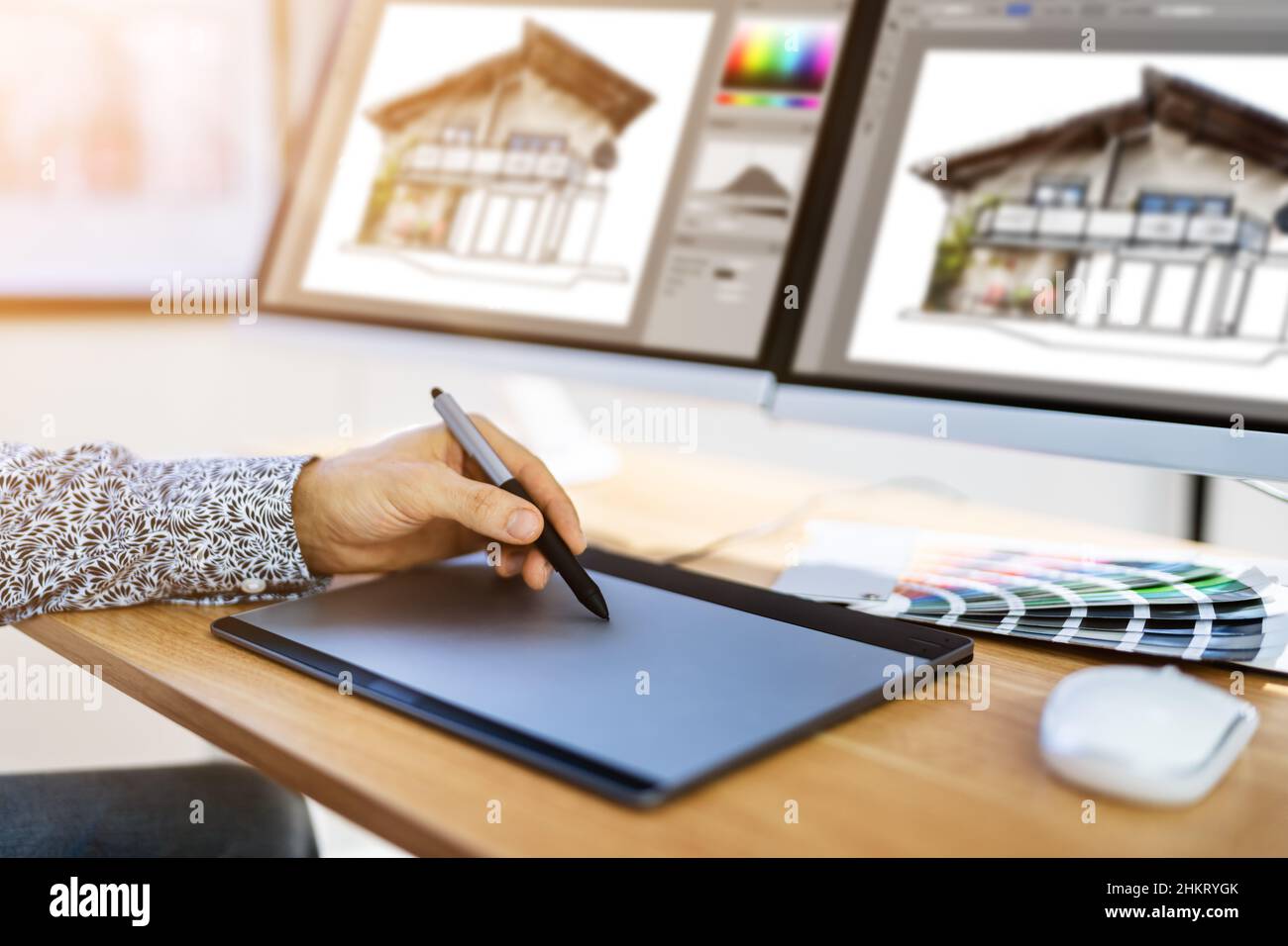 African Graphic Web Designer Using Design Editing Software Stock Photo
