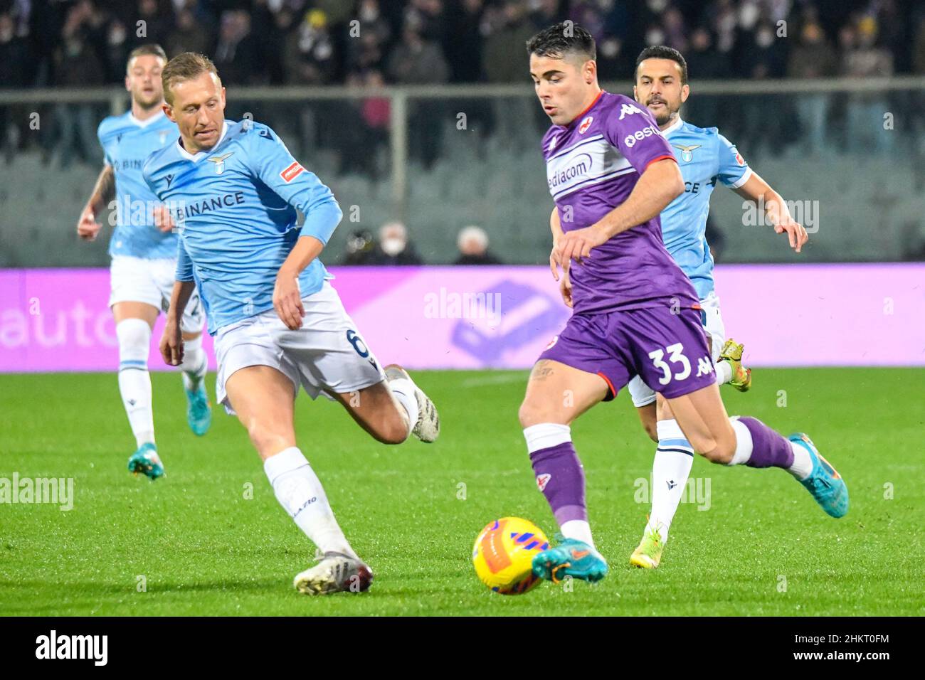 Florence, Italy. 05th Feb, 2022. Riccardo Sottil (Fiorentina) fights for  the ball against Lucas Leiva (Lazio) during ACF Fiorentina vs SS Lazio,  italian soccer Serie A match in Florence, Italy, February 05