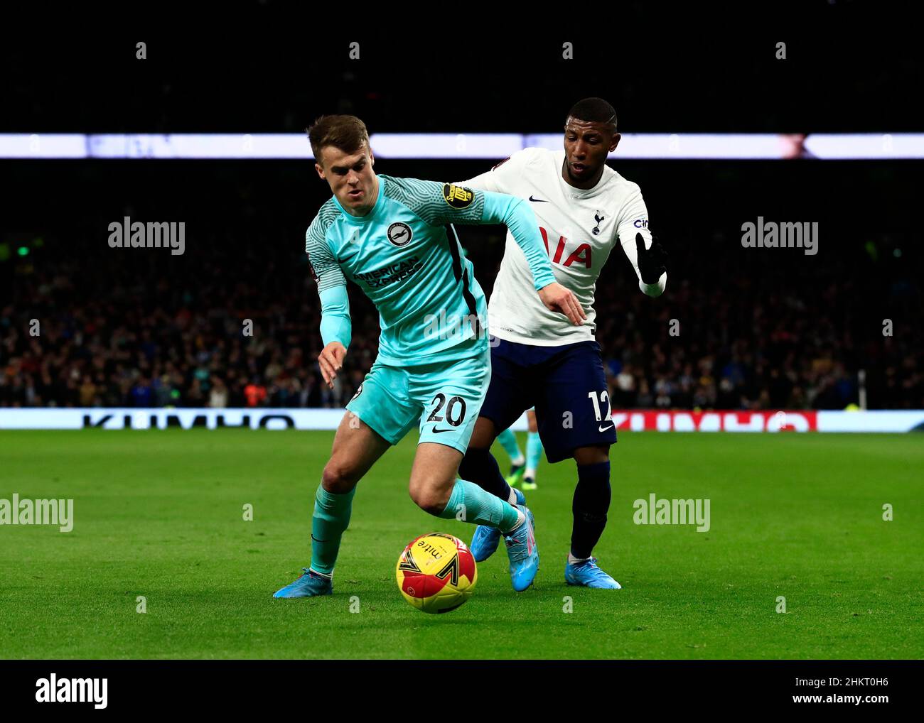 5th February 2022 : Tottenham Hotspur Stadium, Tottenham, London, England; FA Cup football, Tottenham versus Brighton and Hove Albion: Solly March of Brighton &amp; Hove Albion challenged by Emerson Royal of Tottenham Hotspur Stock Photo
