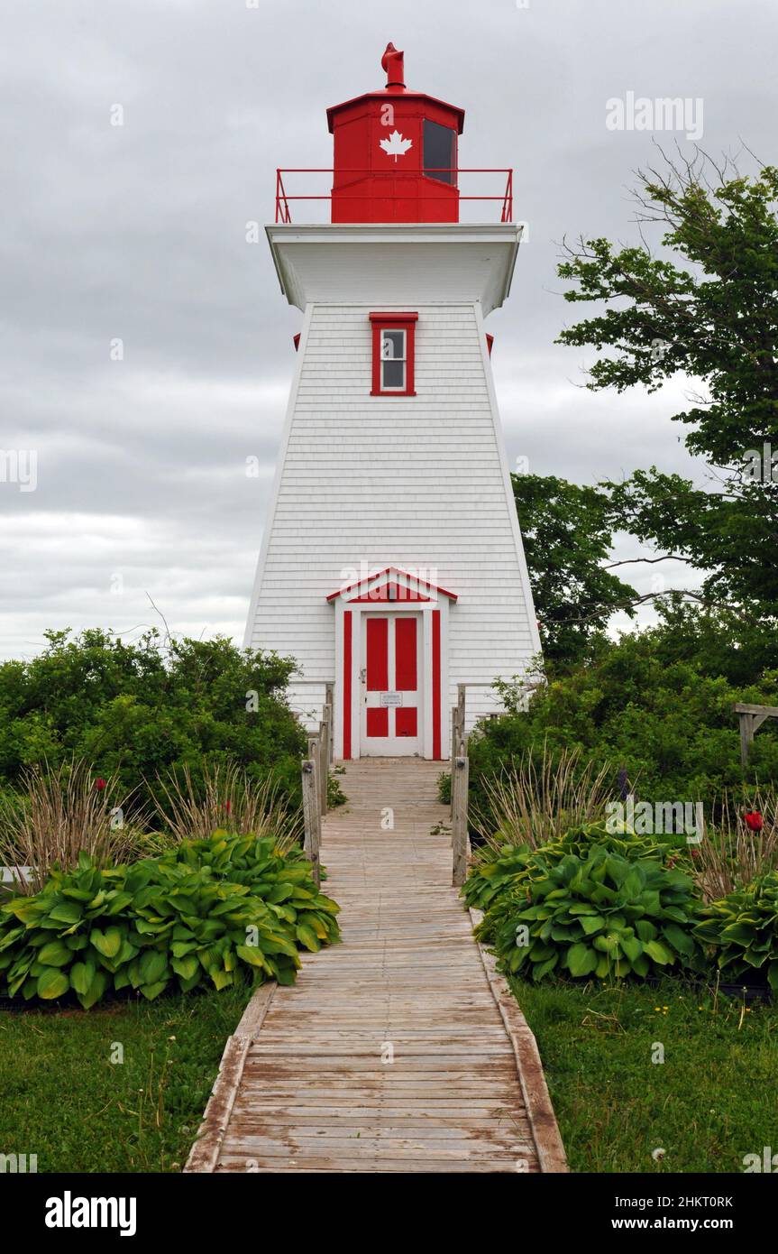 The historic Leards Range Front Lighthouse, housing the Victoria Seaport Museum, stands as a landmark in the south shore village of Victoria, PEI. Stock Photo