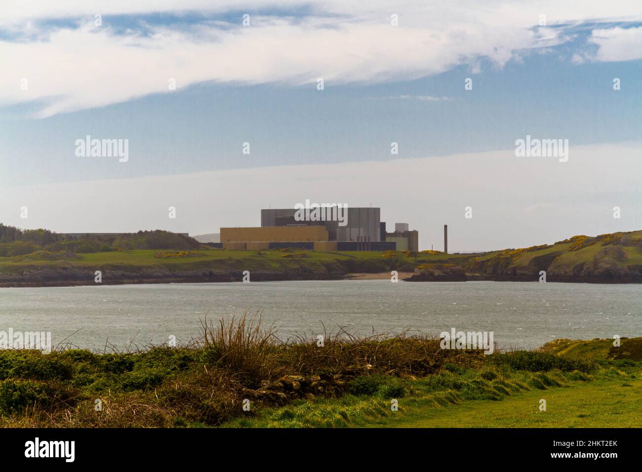 From across water, Wylfa Newydd nuclear power station, Anglesey, Wales, United Kingdom Stock Photo