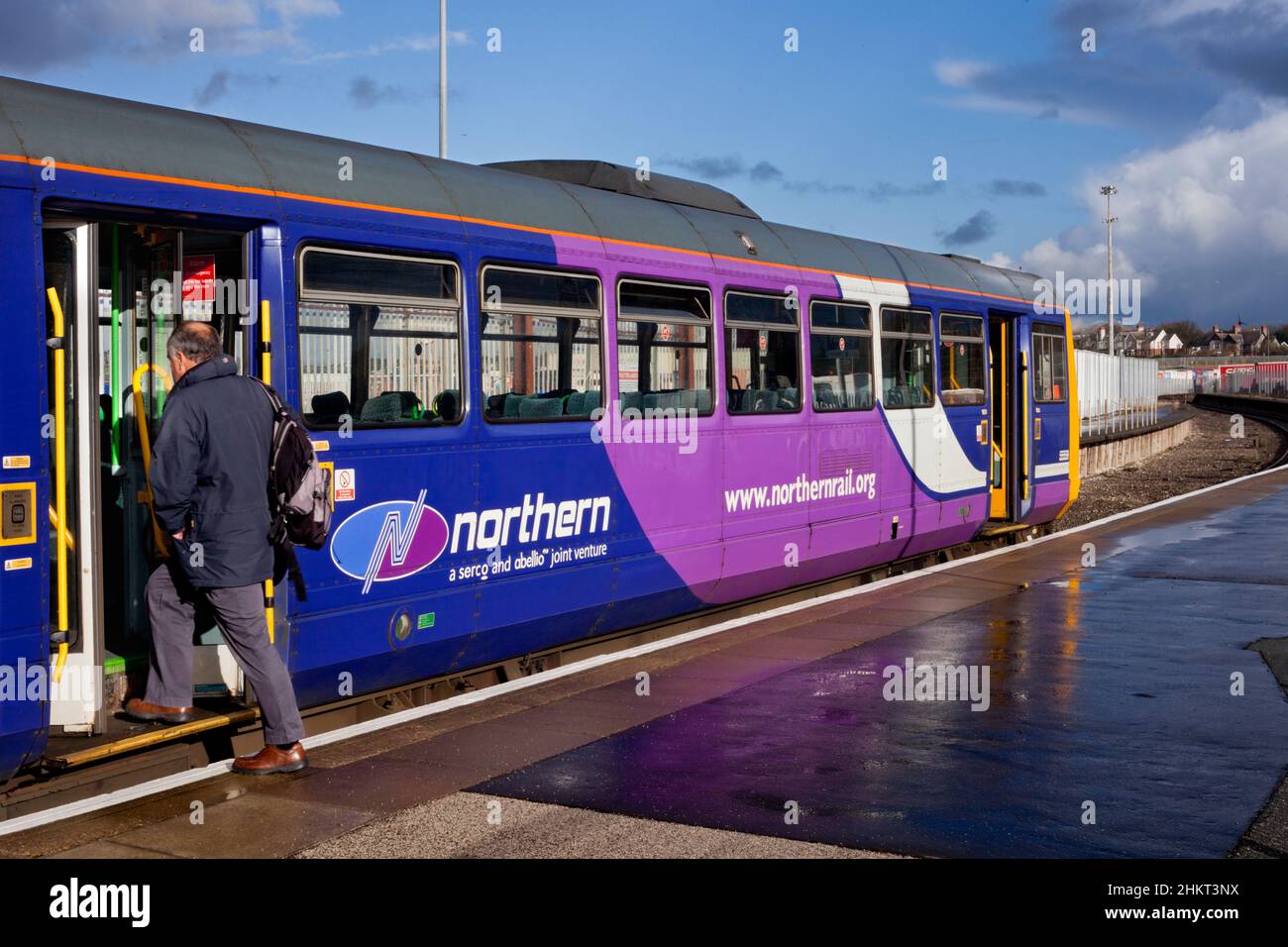 Northern Rail class 142 pacer train  Heysham Port railway station with the daily boat train to connect with the Isle of Man, passenger boarding Stock Photo