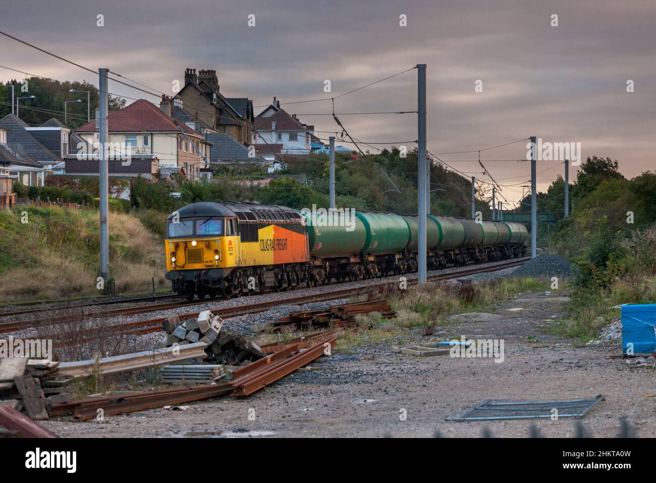Colas rail freight class 56 diesel locomotive 56105 on the west coast mainline with a freight train of empty ' TEA ' 102 tonne aviation fuel tanks Stock Photo