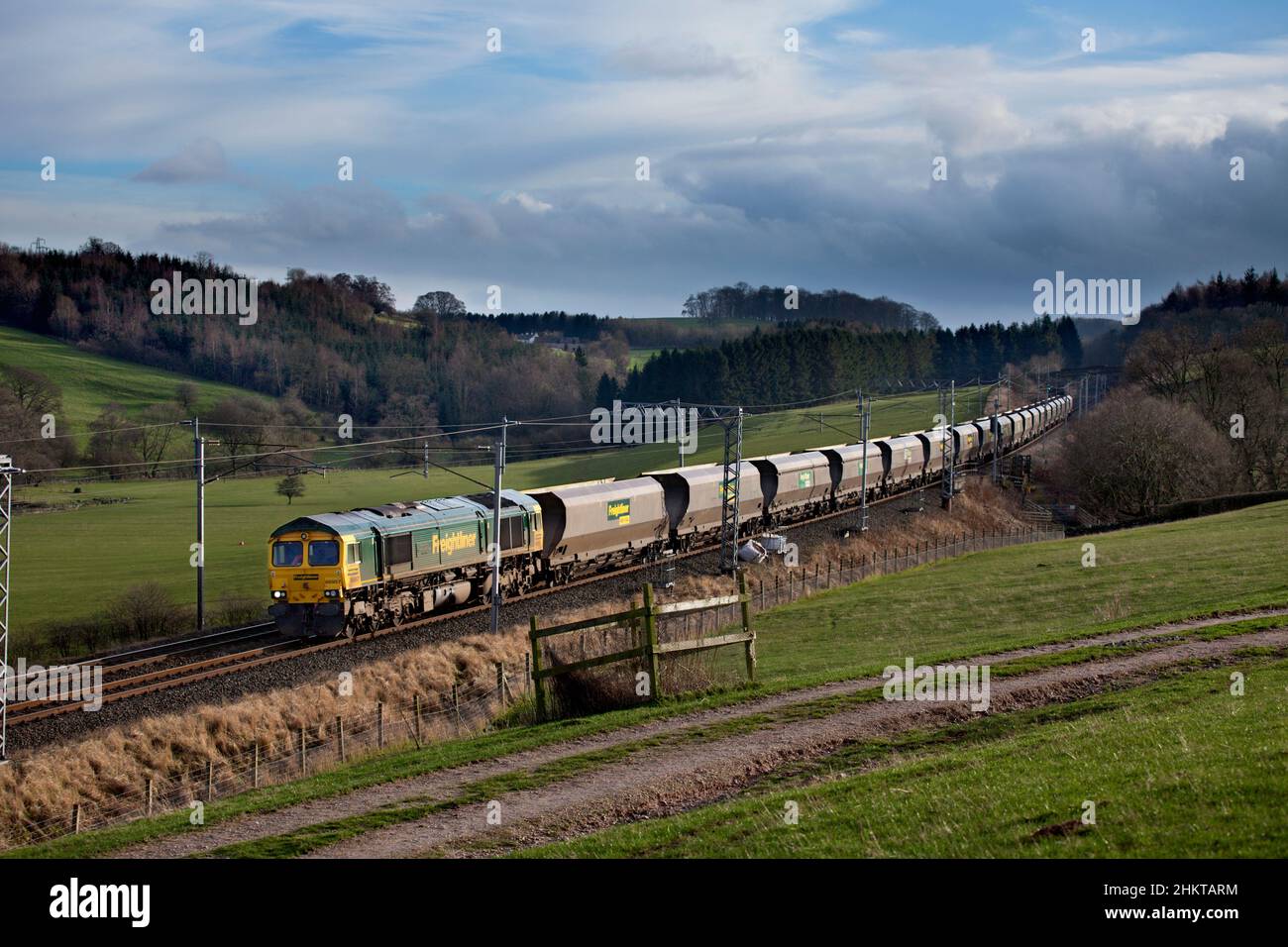 Freightliner class 66 diesel 66957 hauling a Merry go round