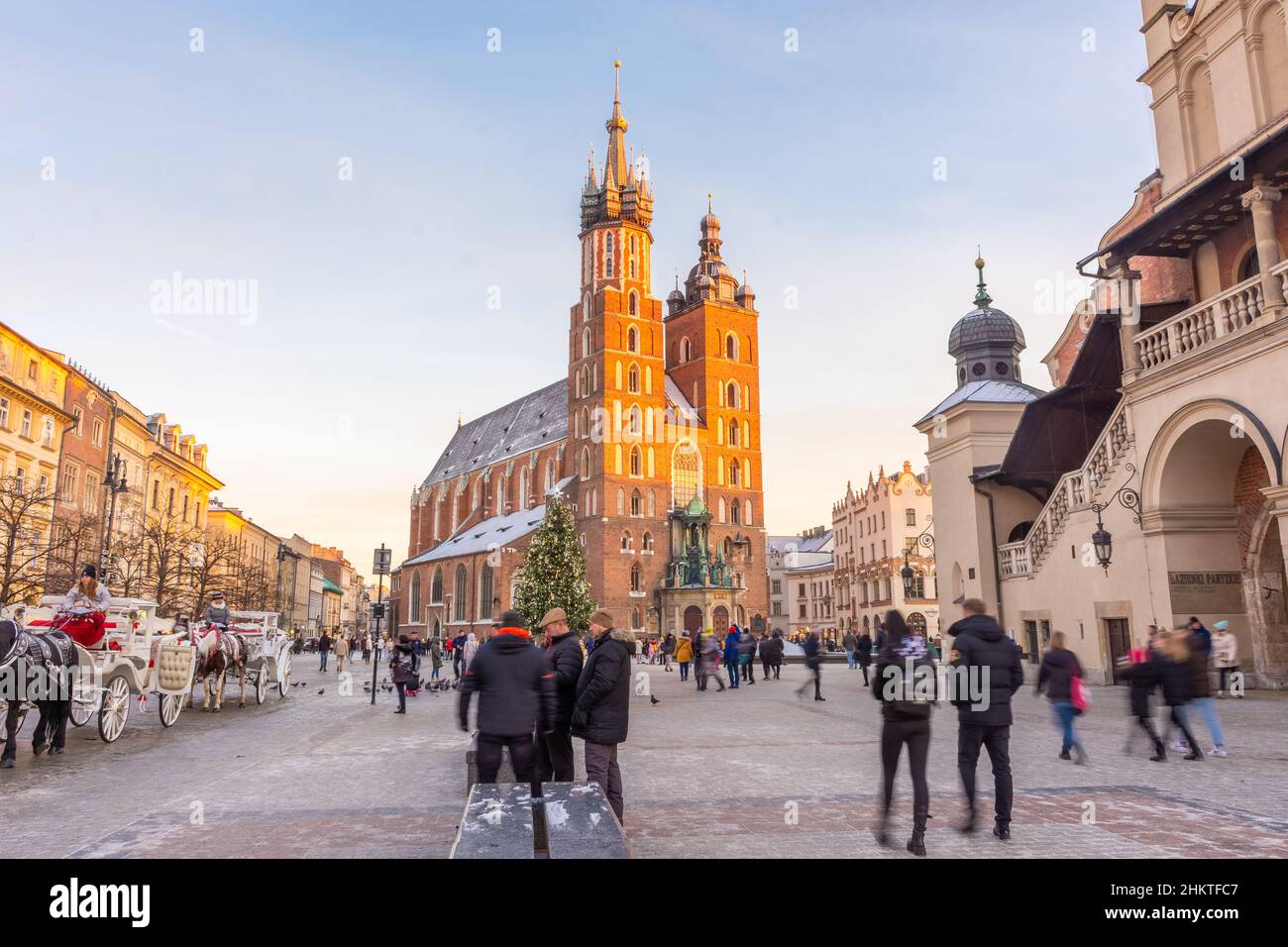 KRAKOW POLAND 7 JANUARY 2022 Sunset Over The St Mary s Basilica In krakow-poland-7-january-2022-sunset-over-the-st-mary-s-basilica-in