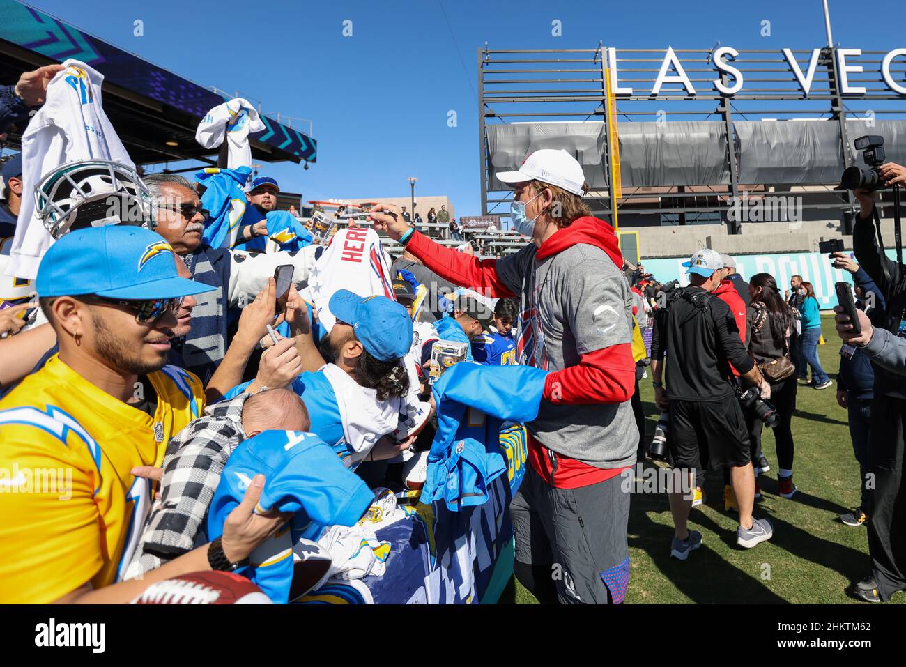Las Vegas, Nevada, USA. 5th Feb, 2022. Los Angeles Chargers quarterback Justin Herbert (10) signs autographs for fans during the AFC Pro Bowl Practice at Las Vegas Ballpark in Las Vegas, Nevada. Darren Lee/CSM/Alamy Live News Stock Photo