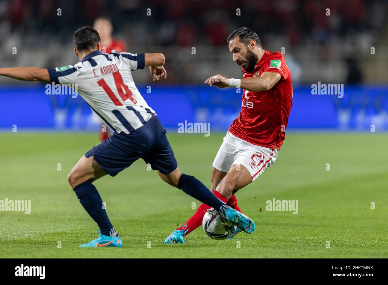 United Arab Emirates, Abu Dhabi - 05 February 2022 - Ali Maaloul of Al-Ahly and Erick Aguirre of C.F. Monterrey in action during the FIFA Club World Cup 2nd round match between Al-Ahly and C.F. Monterrey at Al-Nahyan Stadium, UAE, 05/02/2022. Photo by Ayman Kamel/SFSI Stock Photo