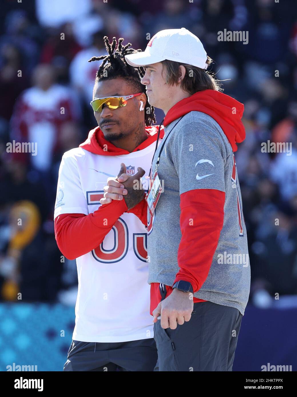 Las Vegas, Nevada, USA. 5th Feb, 2022. Los Angeles Chargers quarterback Justin Herbert (10) and Los Angeles Chargers safety Derwin James (33) shaking hands during the AFC Pro Bowl Practice at Las Vegas Ballpark in Las Vegas, Nevada. Darren Lee/CSM/Alamy Live News Stock Photo