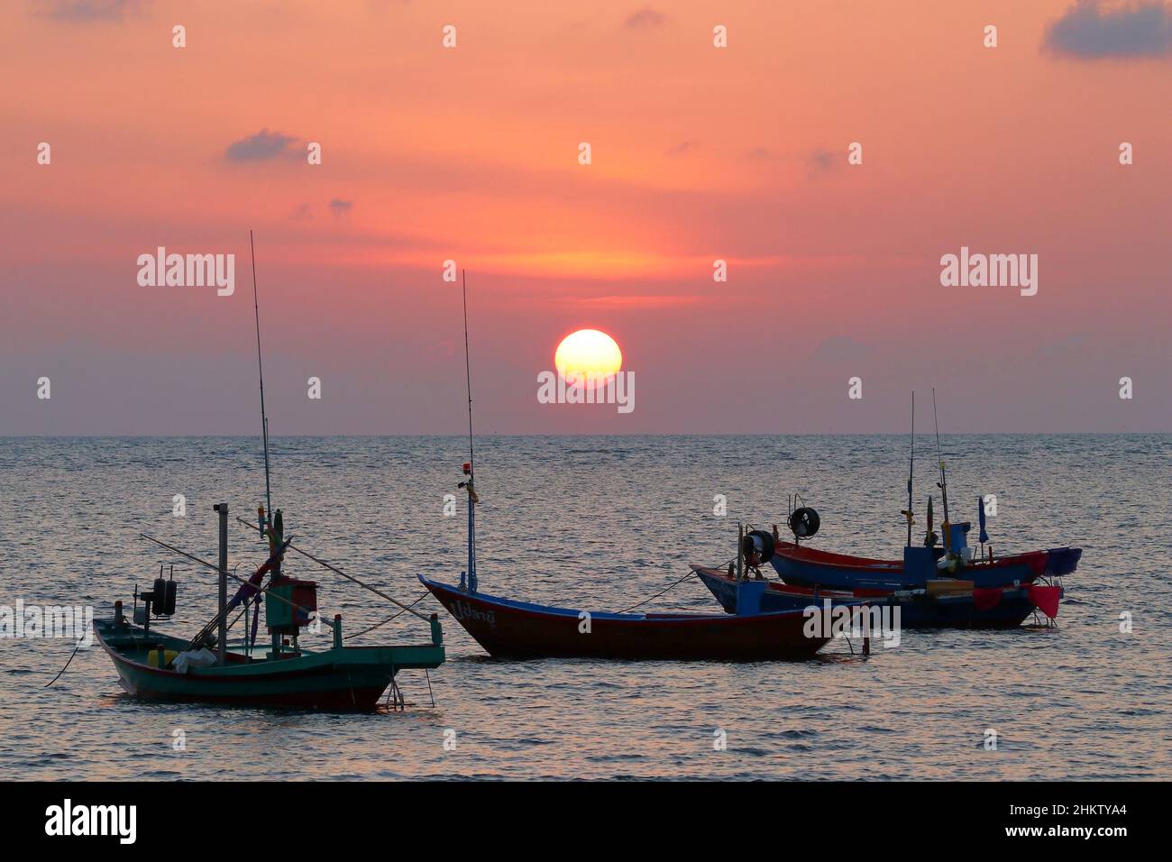 fishing boat in the sea with beautiful sunset background Stock Photo ...