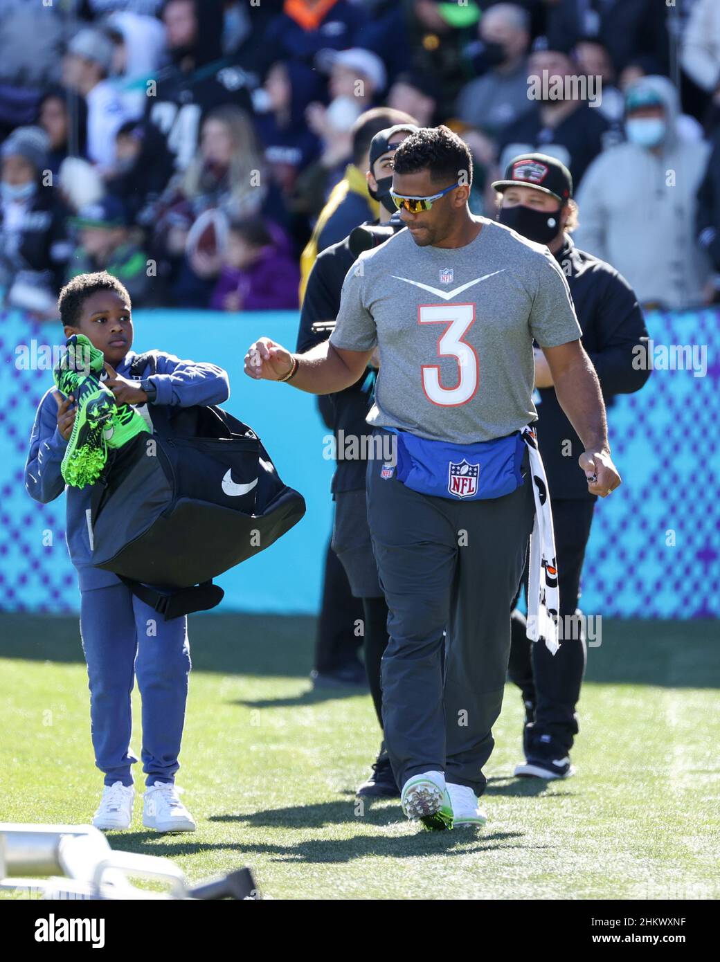 Las Vegas, Nevada, USA. 5th Feb, 2022. Seattle Seahawks quarterback Russell Wilson (3) autographing and giving away shoes during the NFC Pro Bowl Practice at Las Vegas Ballpark in Las Vegas, Nevada. Darren Lee/CSM/Alamy Live News Stock Photo