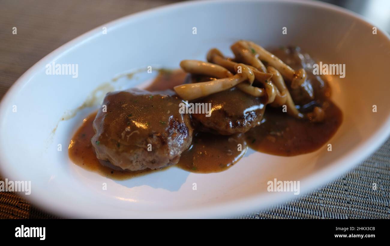 Hamburger Beef Patties with Gravy and Fried Mushrooms Stock Photo Alamy