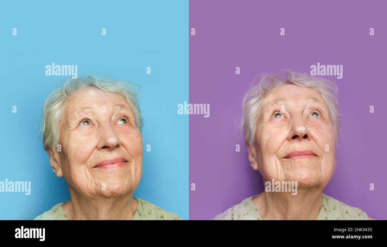 Smiling senior woman on blue. Hope and dreams concept Stock Photo
