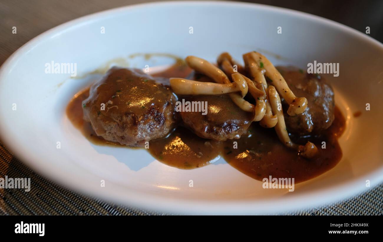 Hamburger Beef Patties with Gravy and Fried Mushrooms Stock Photo Alamy