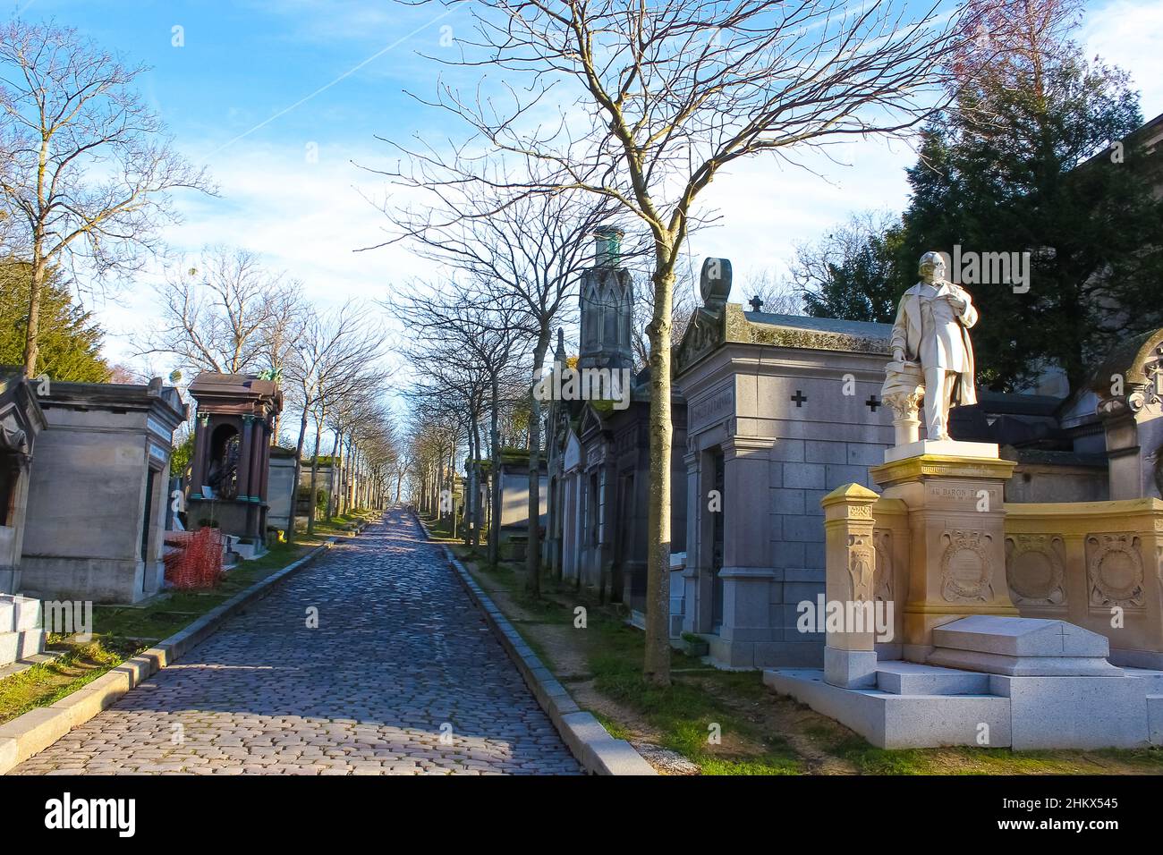 Paris, France - January 01, 2022: Graves and crypts in Pere Lachaise Cemetery, This cemetery is the final resting place for many famous people. Stock Photo