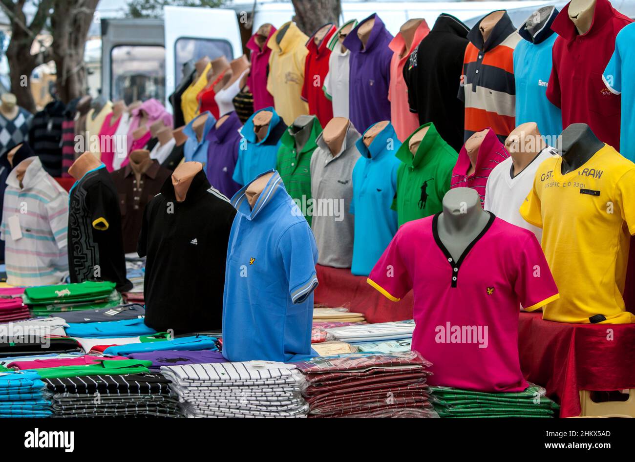 A variety of colourful mens shirts for sale at the Kas Friday market. Kas is a village which sits on the Mediterranean Sea of Turkey. Stock Photo