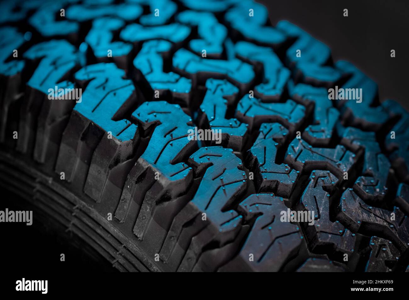 Detail of off road or offroad 4x4 tire tread. Studio lighting with