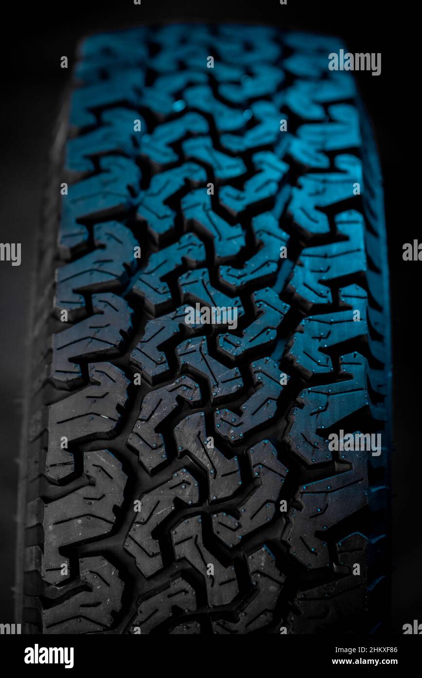 Detail of off road or offroad 4x4 tire tread. Studio lighting with