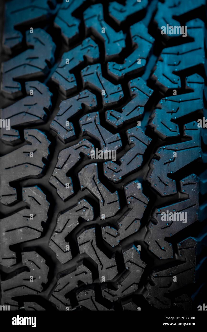 Detail of off road or offroad 4x4 tire tread. Studio lighting with
