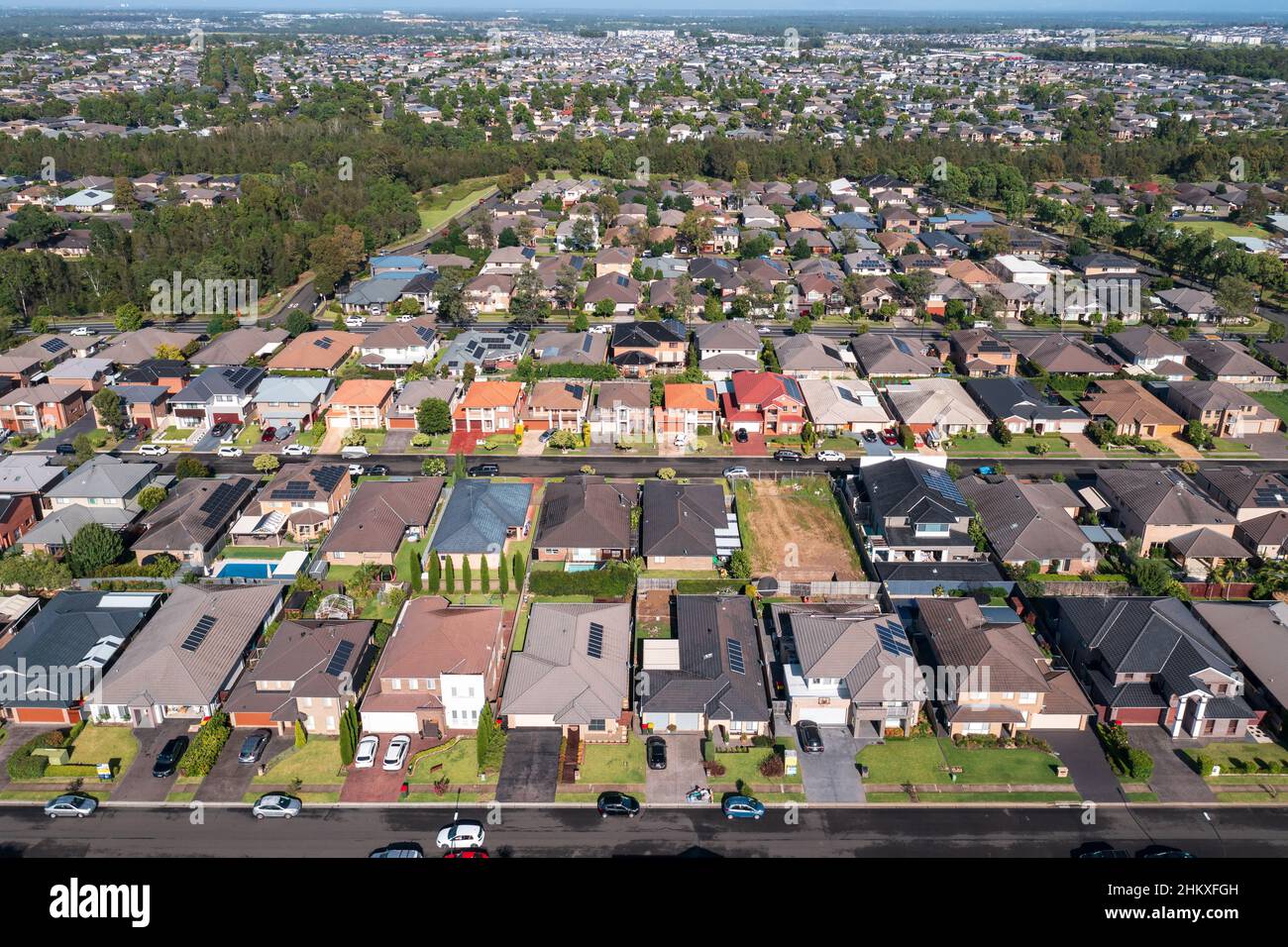 Aerial view of rows of typical homes built during the 2010s in outer suburban Sydney, Australia. Stock Photo