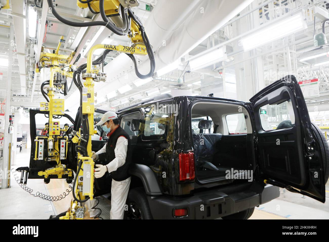 CHONGQING, CHINA FEBRUARY 6, 2022 Technicians install the body of a