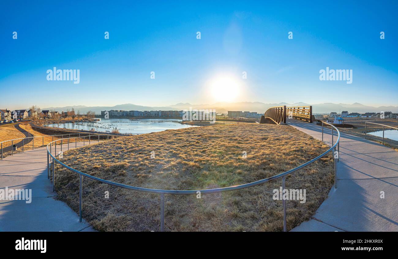 Curved pathway metal barriers near the bridge over the Oquirrh lake at Daybreak, South Jordan, Utah Stock Photo