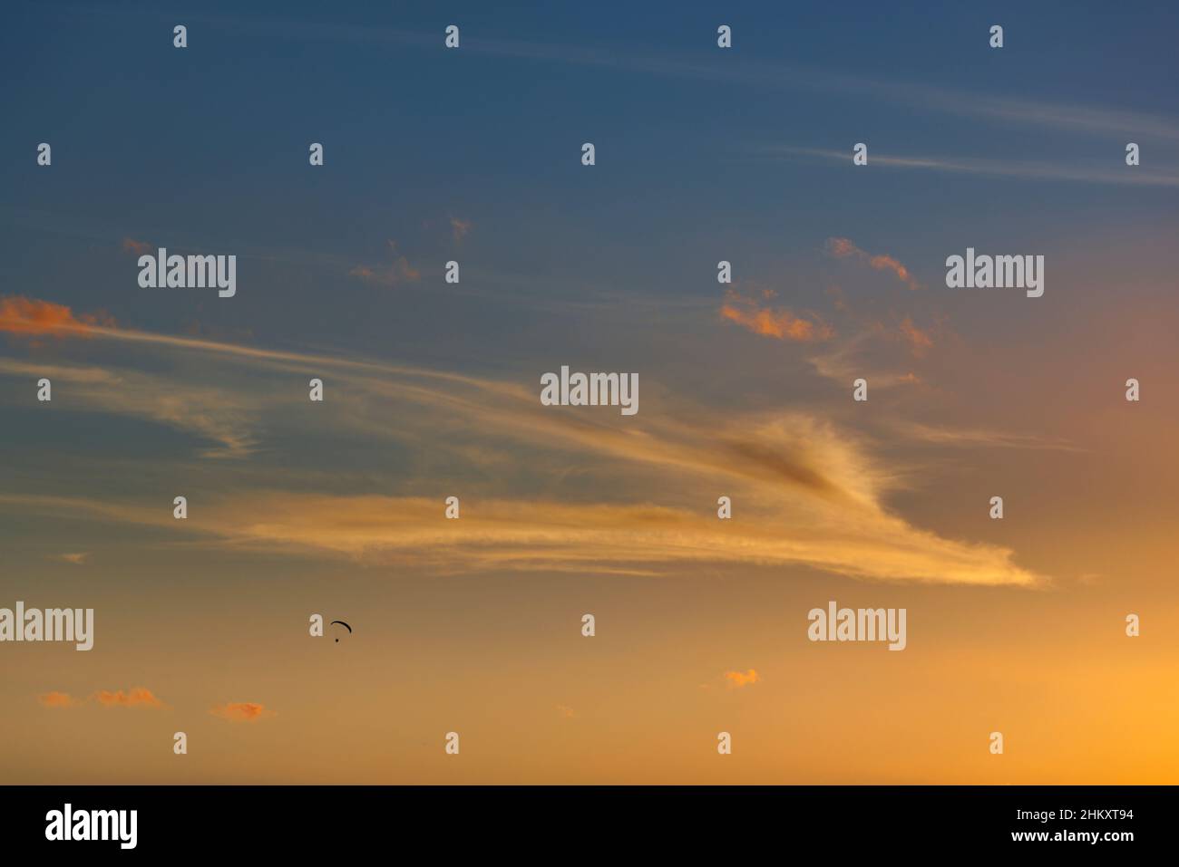 Cloud against a blue sky Stock Photo - Alamy