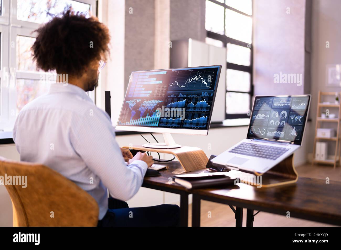 African American Data Analyst Using Data Analytics KPI Dashboard Stock ...