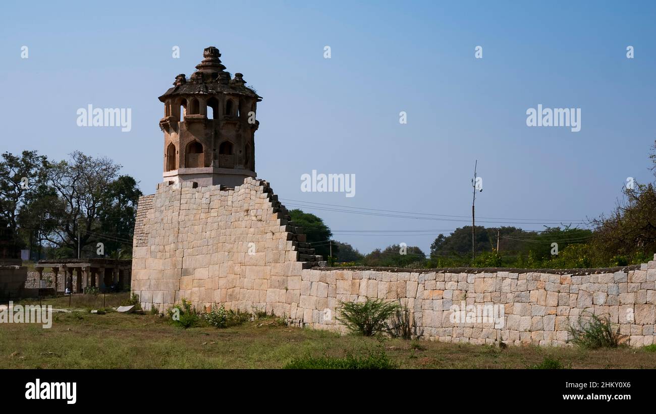 a long view of Zanana (residential quarters for women) enclosure with high raised wall: Hampi, Karnataka, India-February 01.2022 Stock Photo